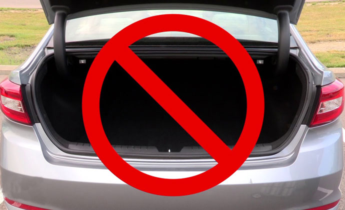 Don't put oxygen tanks loosely in a car's trunk